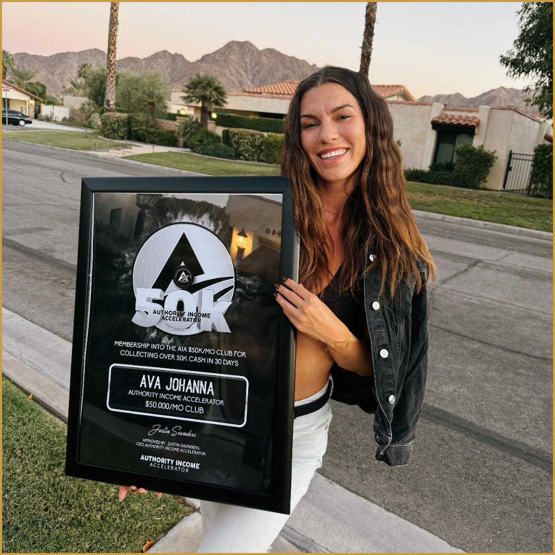 Ava Johanna with their AIA award plaque